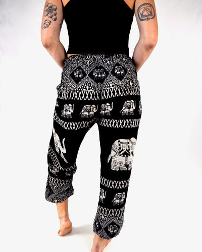 Front-view diamond elephant pants in black with model and white background-fullsize image